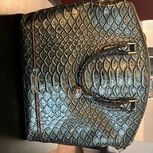Brahmin purse teal and gold.  I get tons of compliments on this purse